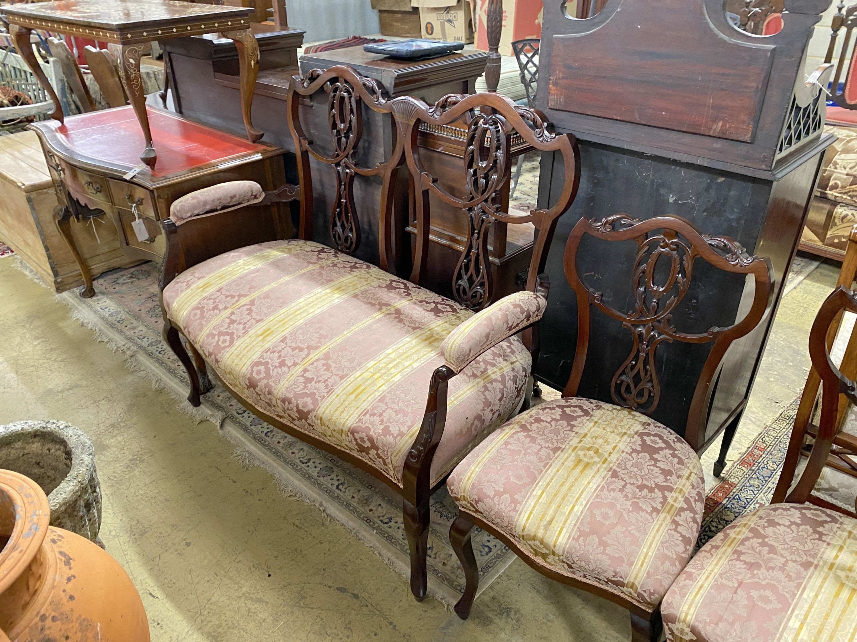 A late Victorian mahogany seven piece salon suite, settee length 120cm, depth 54cm, height 108cm